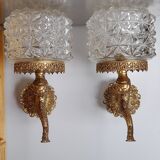 Pair of dolphin brass sconces
