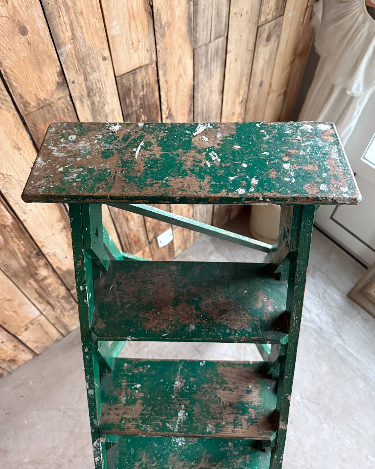 Vintage stepladder with green patina