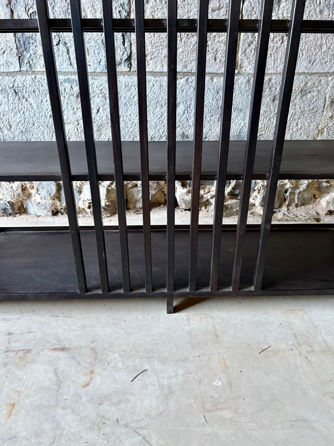 Large industrial black metal shelf – openwork graphic structure