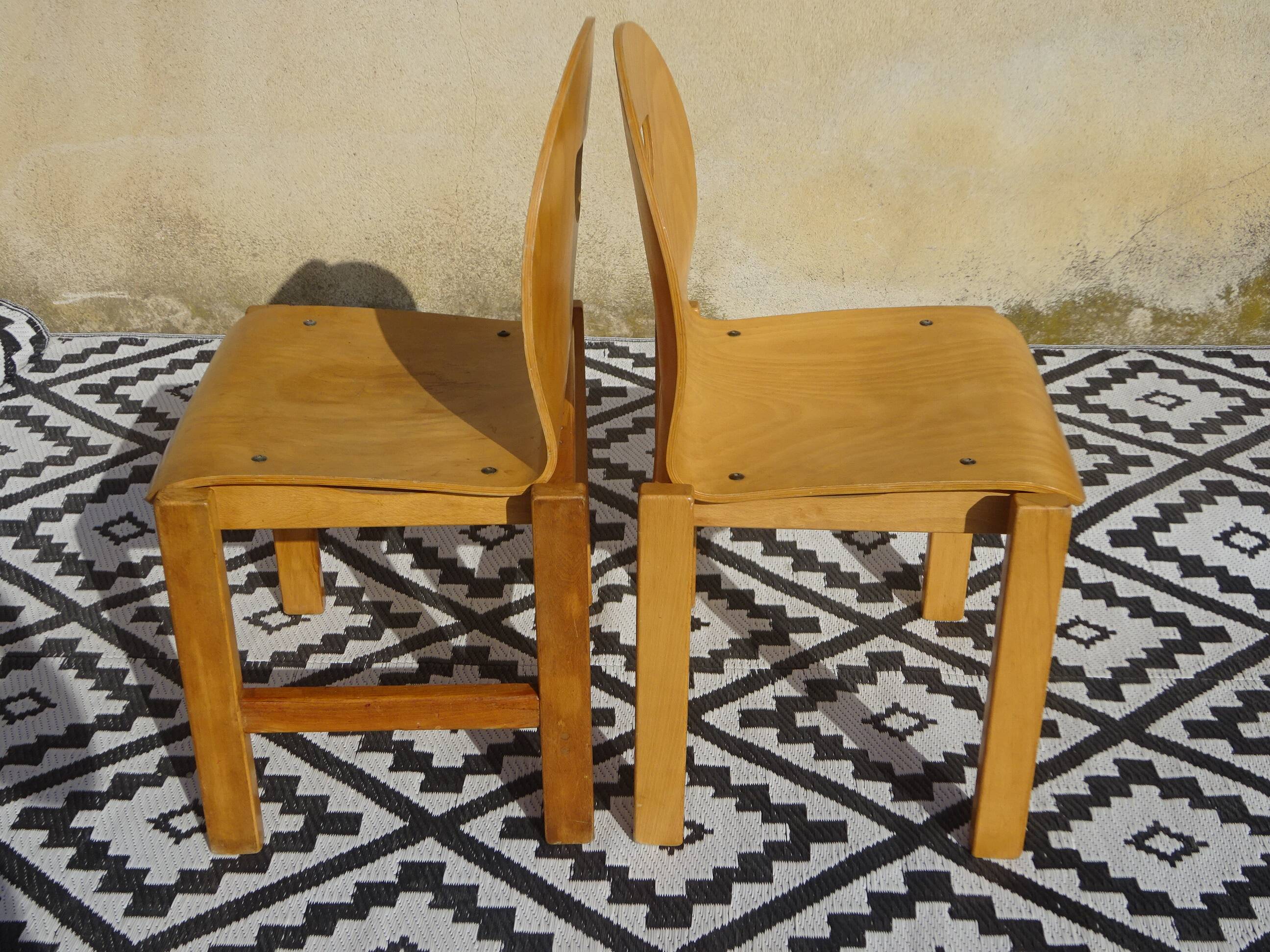 Light wood post-formed chairs, the 2.