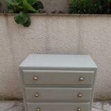 Vintage commode enhanced in grey-green.