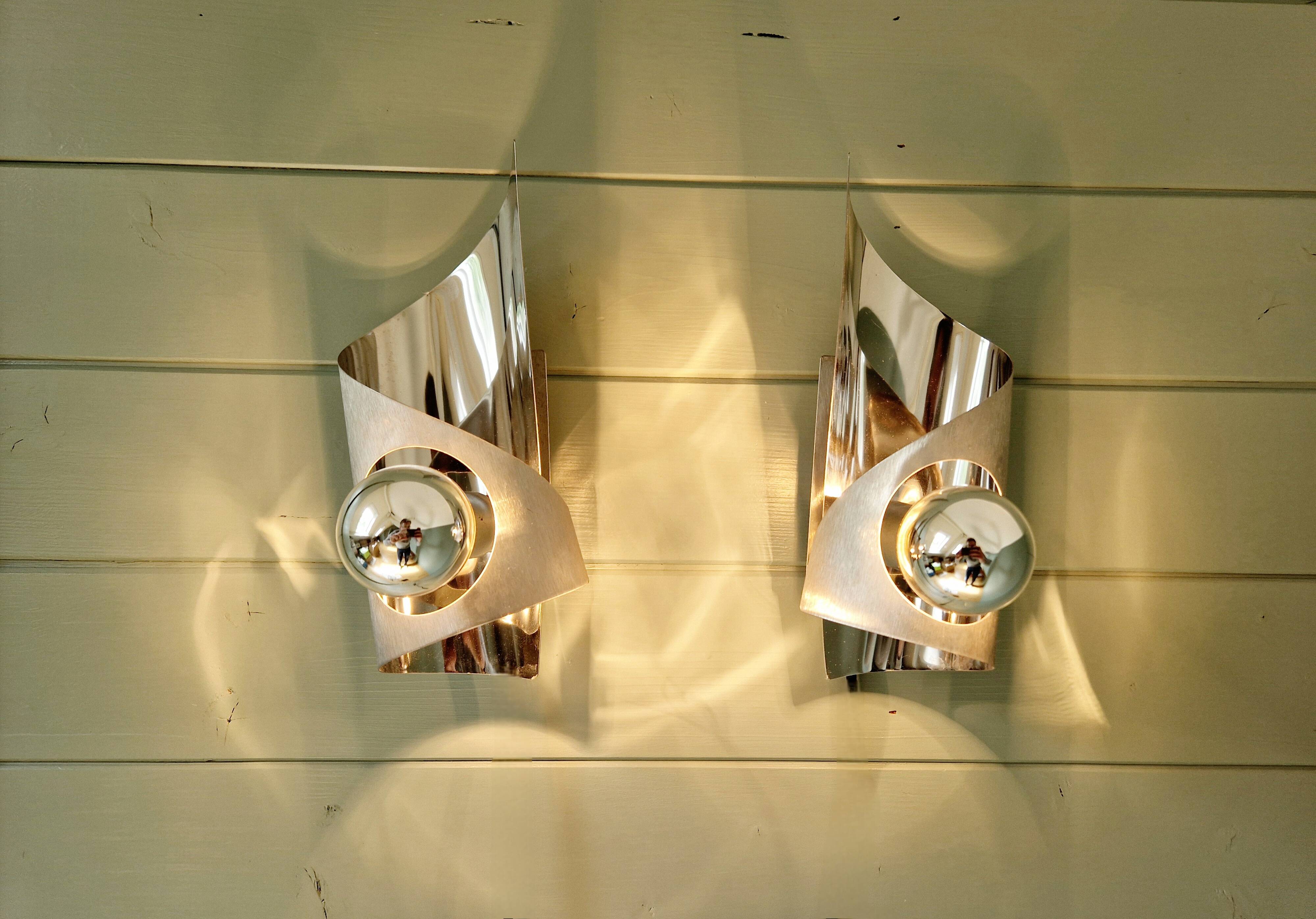 Pair of brushed aluminum wall lights, 1970s
