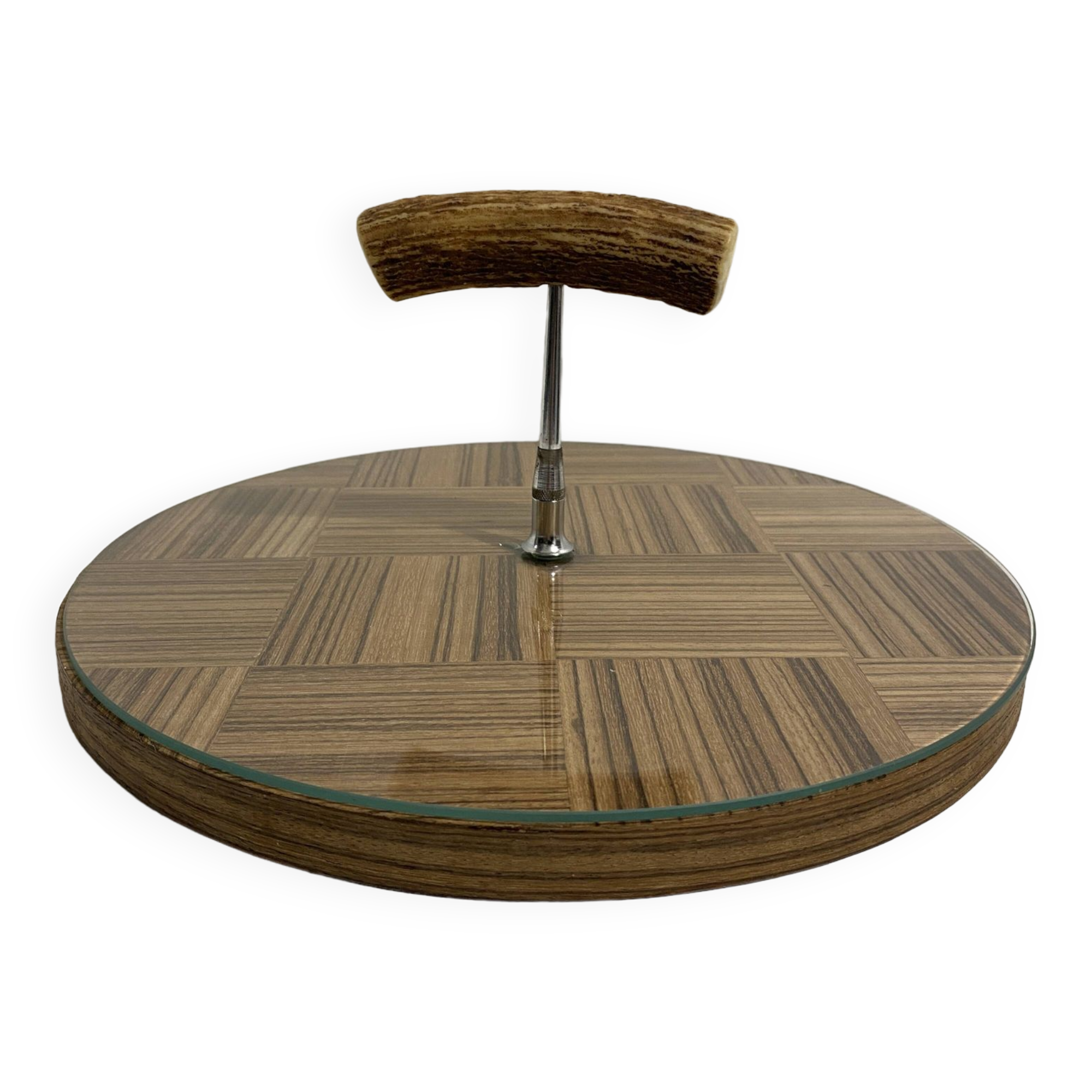 Vintage round wooden cheese board covered with glass plate with foldable handle