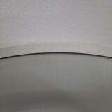 Armoire à barre vintage en forme de cylindre ouvrable, bois, laiton et verre.