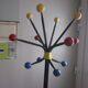 Vintage coat holder has 12 balls