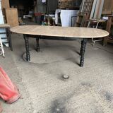 Oval table with integrated extension