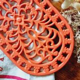 Orange enamelled cast iron oval trivet