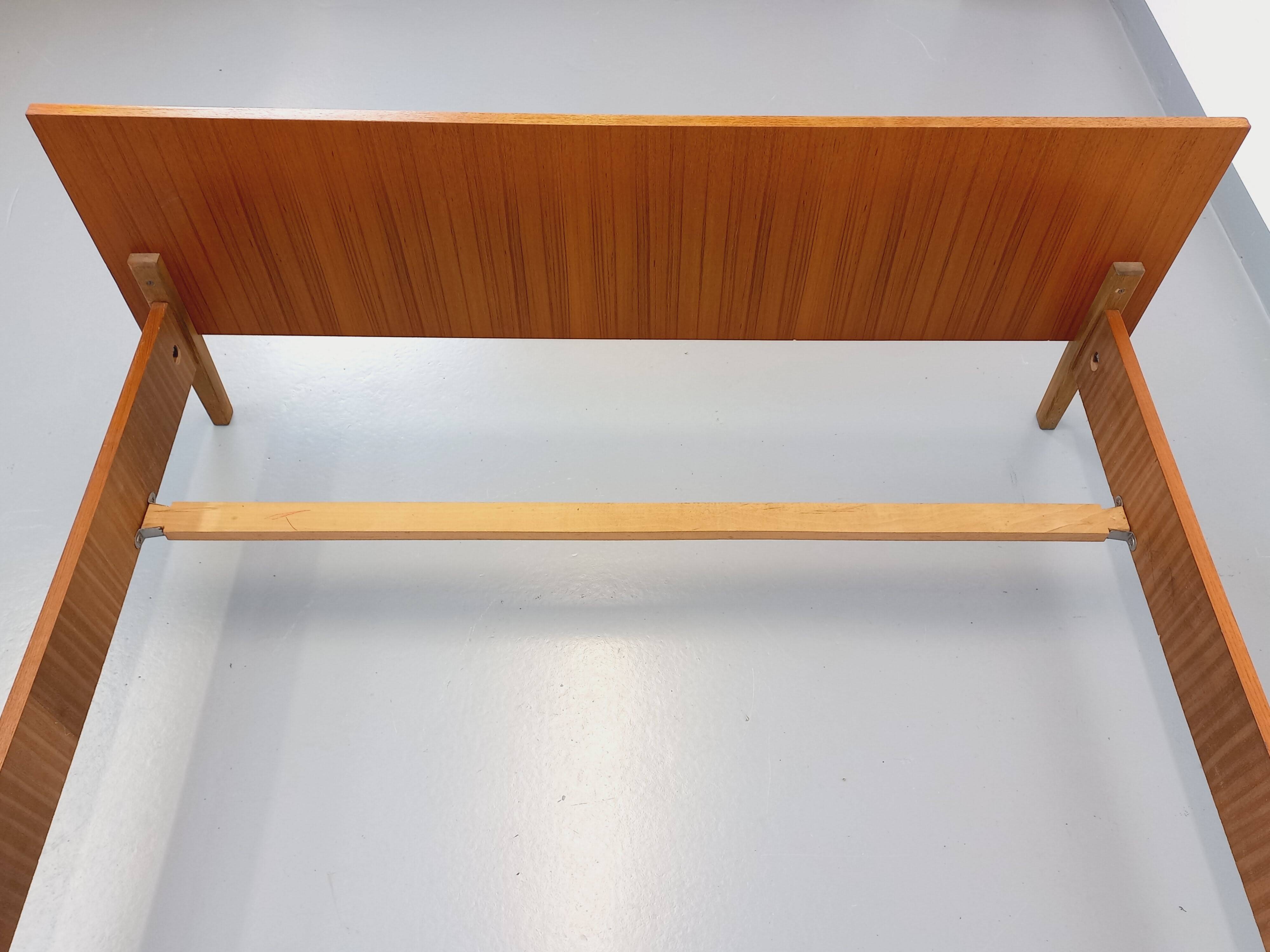 Vintage Scandinavian style double bed in teak from the 60s with integrated bedside lights
