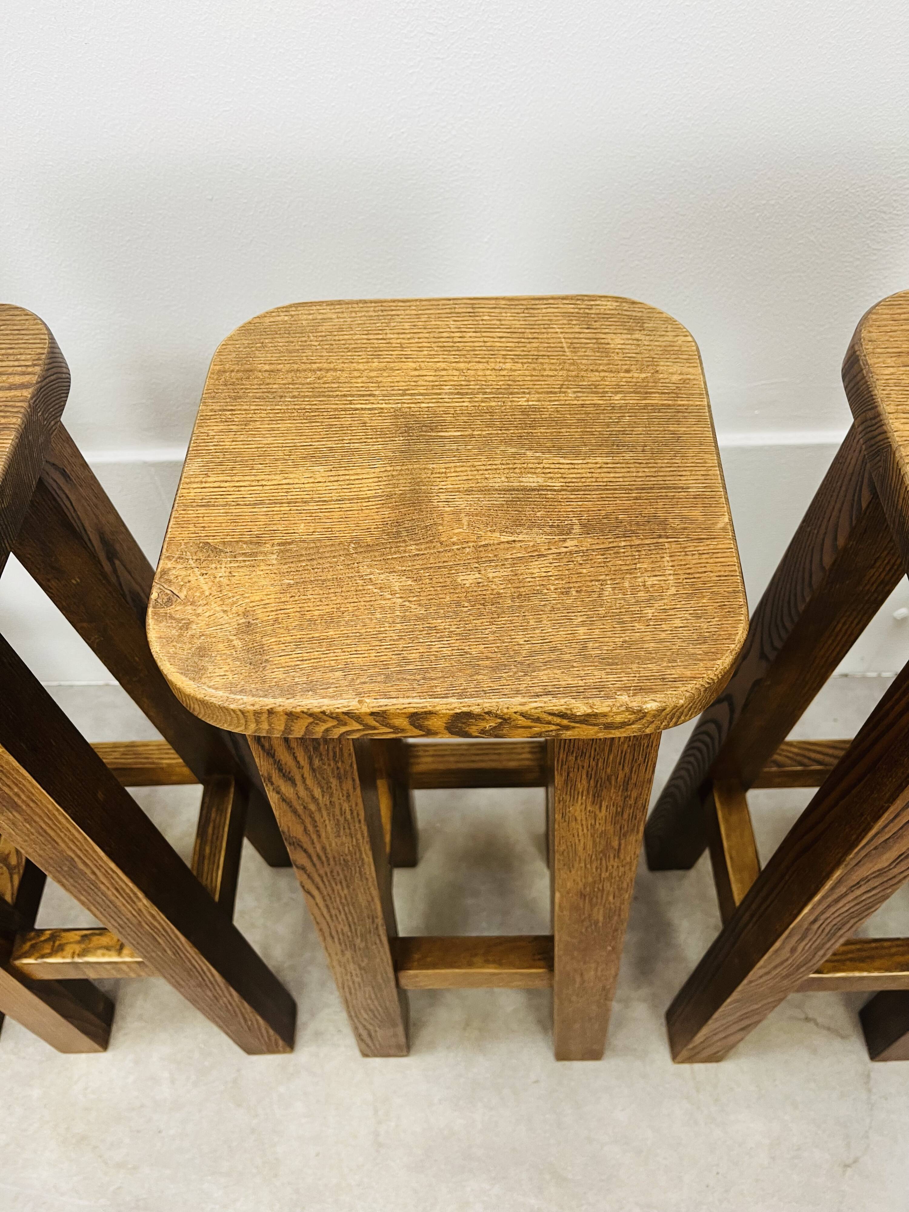 8 solid wood bar stools in brutalist style