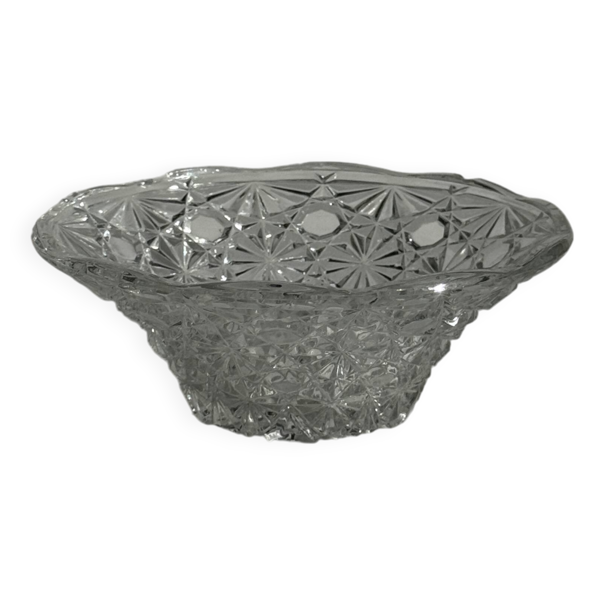 Small glass dish with vintage diamond points, a sparkle.