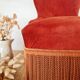 Red velvet toad armchair with fringes