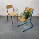 Set of 2 mismatched industrial school chairs