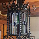 Wrought iron lantern with colored stained glass