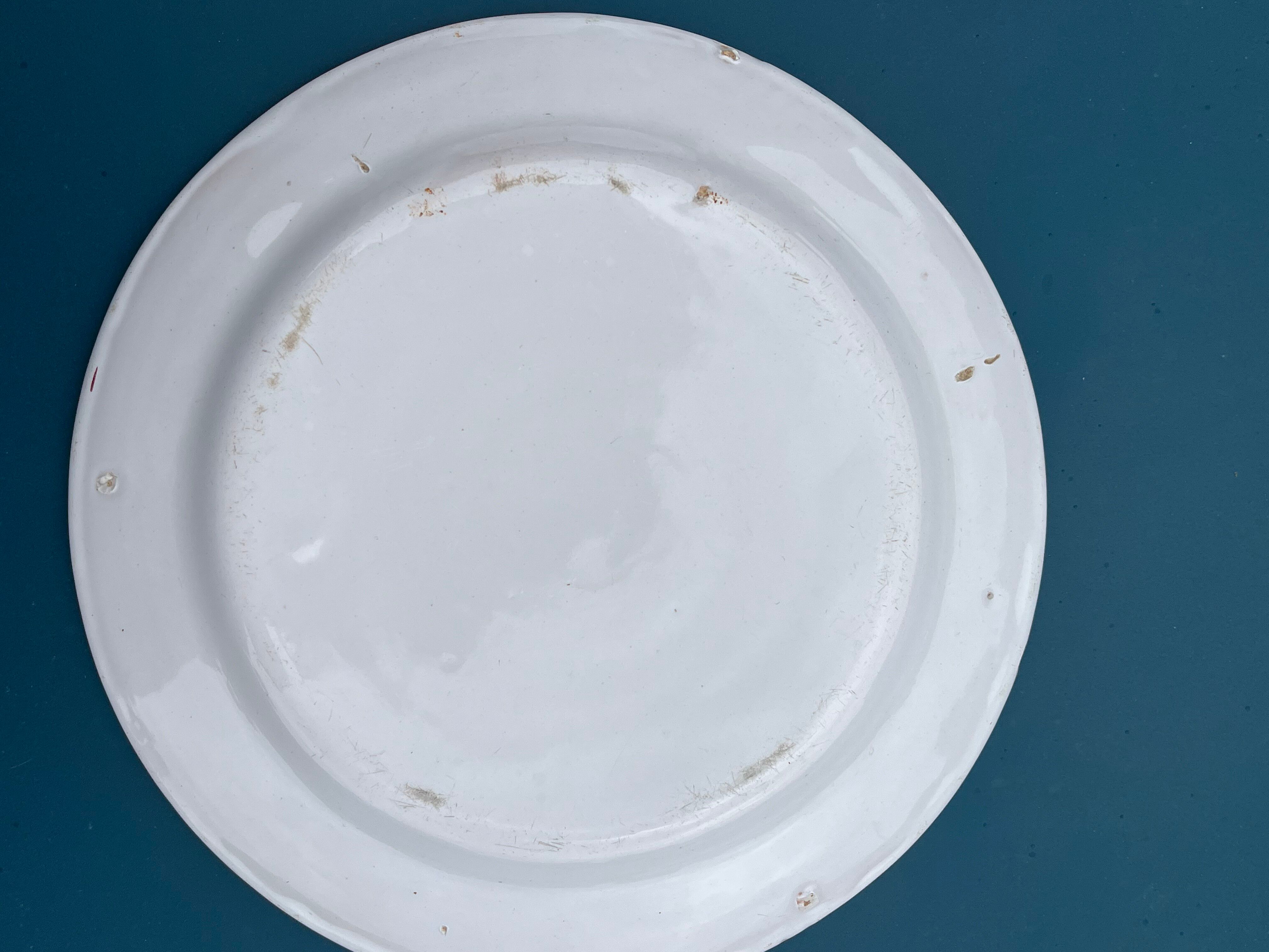 Two very old earthenware plates from the East.