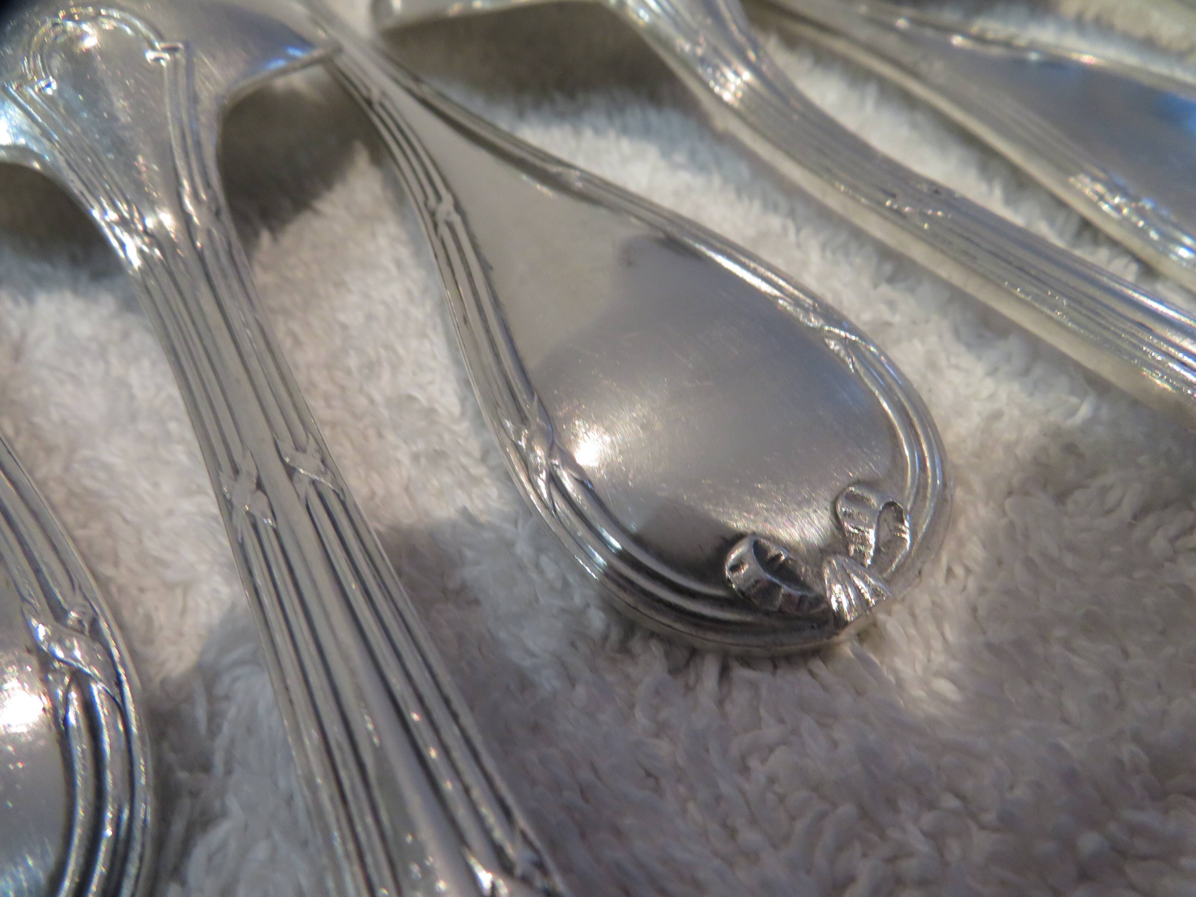 12 silver plated soup spoons by Christofle with Louis XVI ribbons