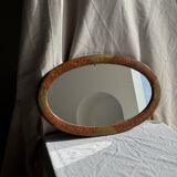 Small oval Art Deco mirror in brown and gold 33x54.