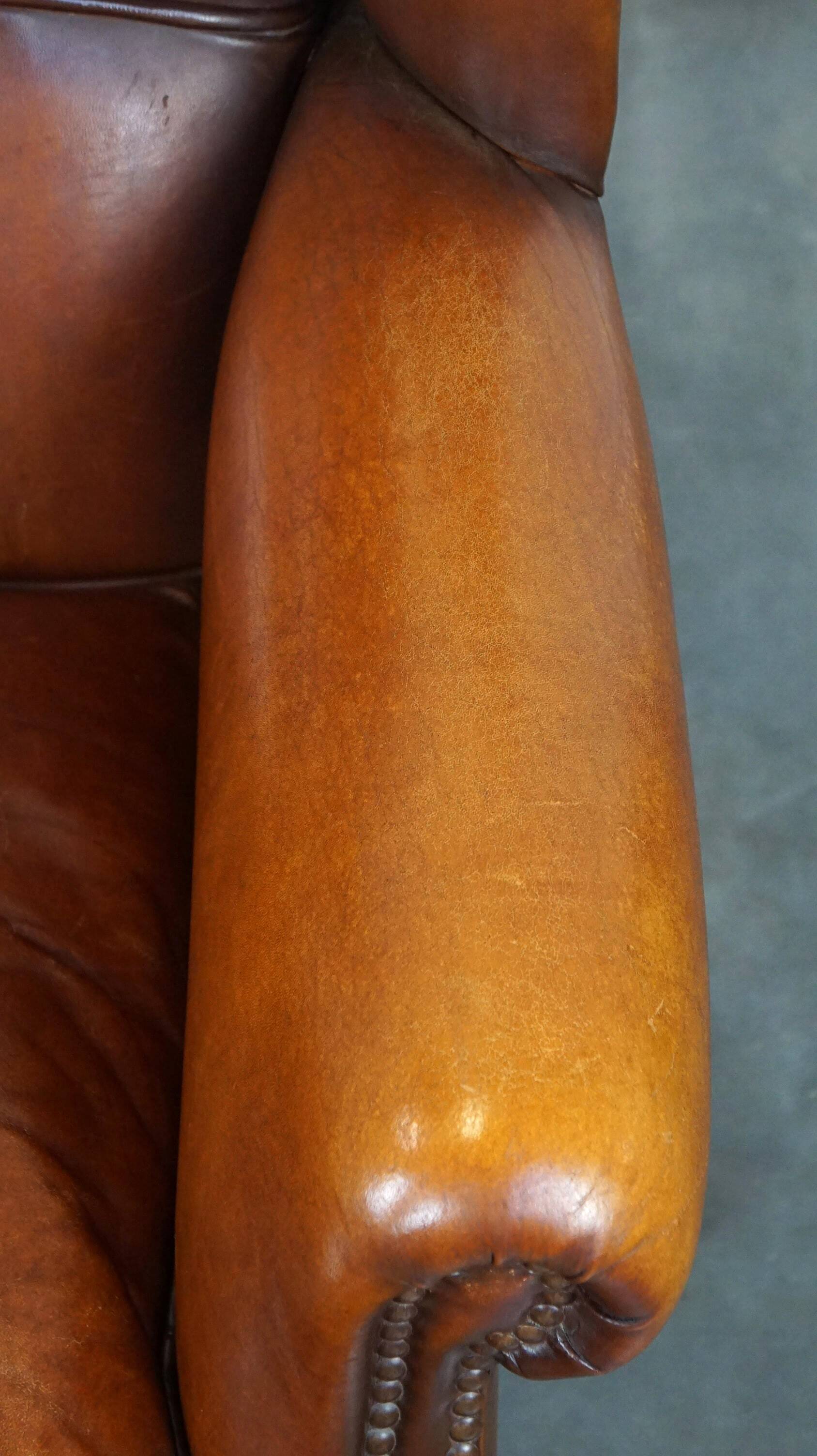 Beautiful and Comfortable Sheepskin Wingback Armchair with a Wonderful Patina