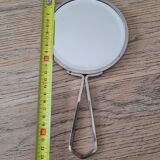 Mirror "face to hand" in chromed metal