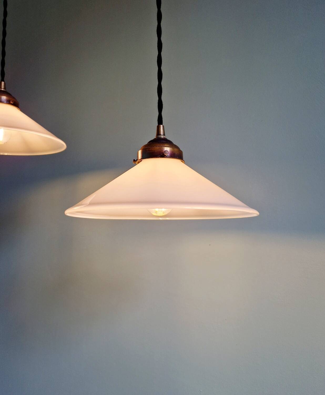 Pair of Art Deco conical white opaline pendants, 1920-30.