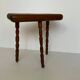 Tabouret tripode en bois massif