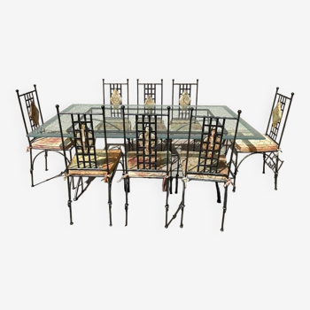 Table de jardin en fer et plateau en verre ainsi que les 8 chaises