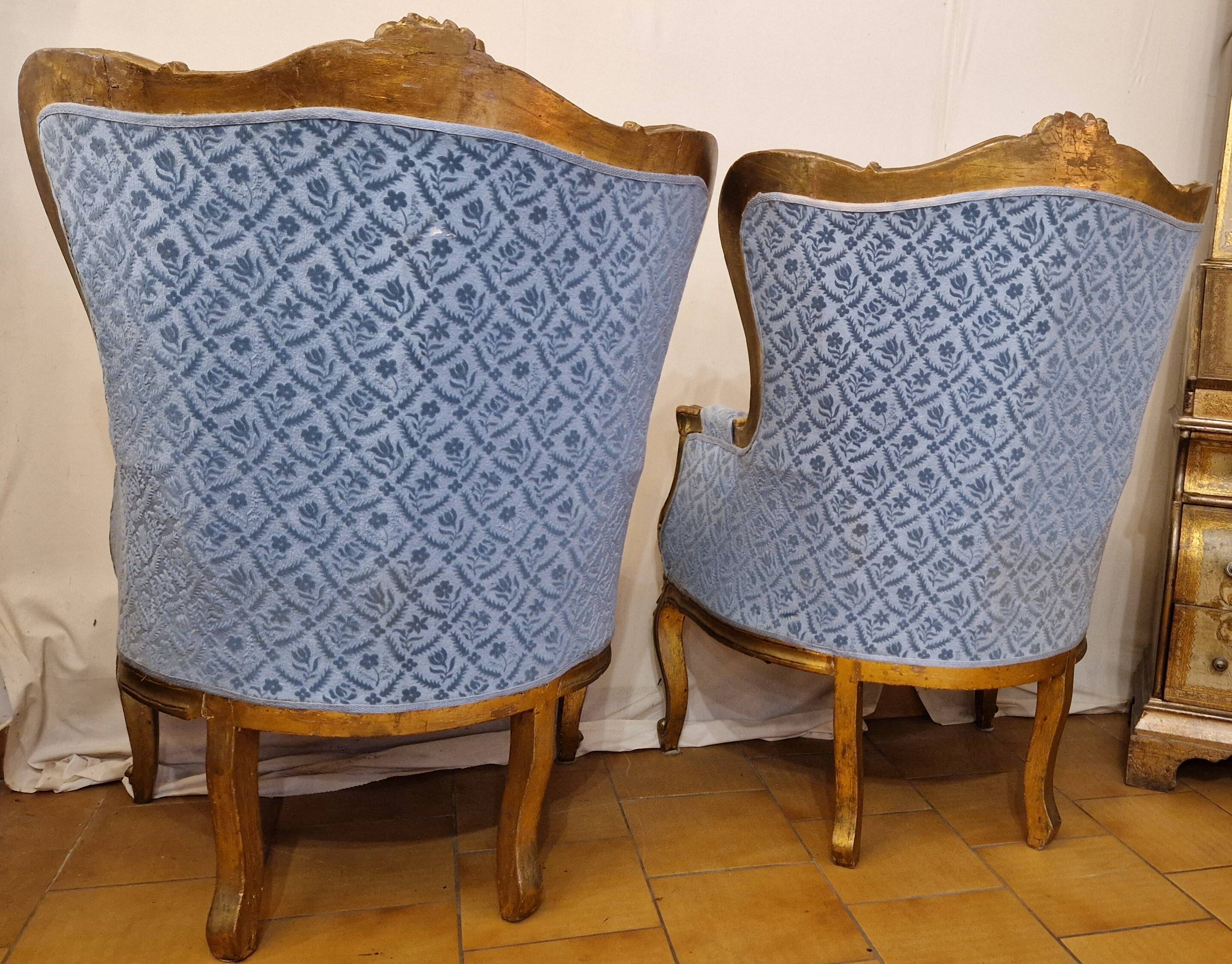 Pair of gilded bergère armchairs