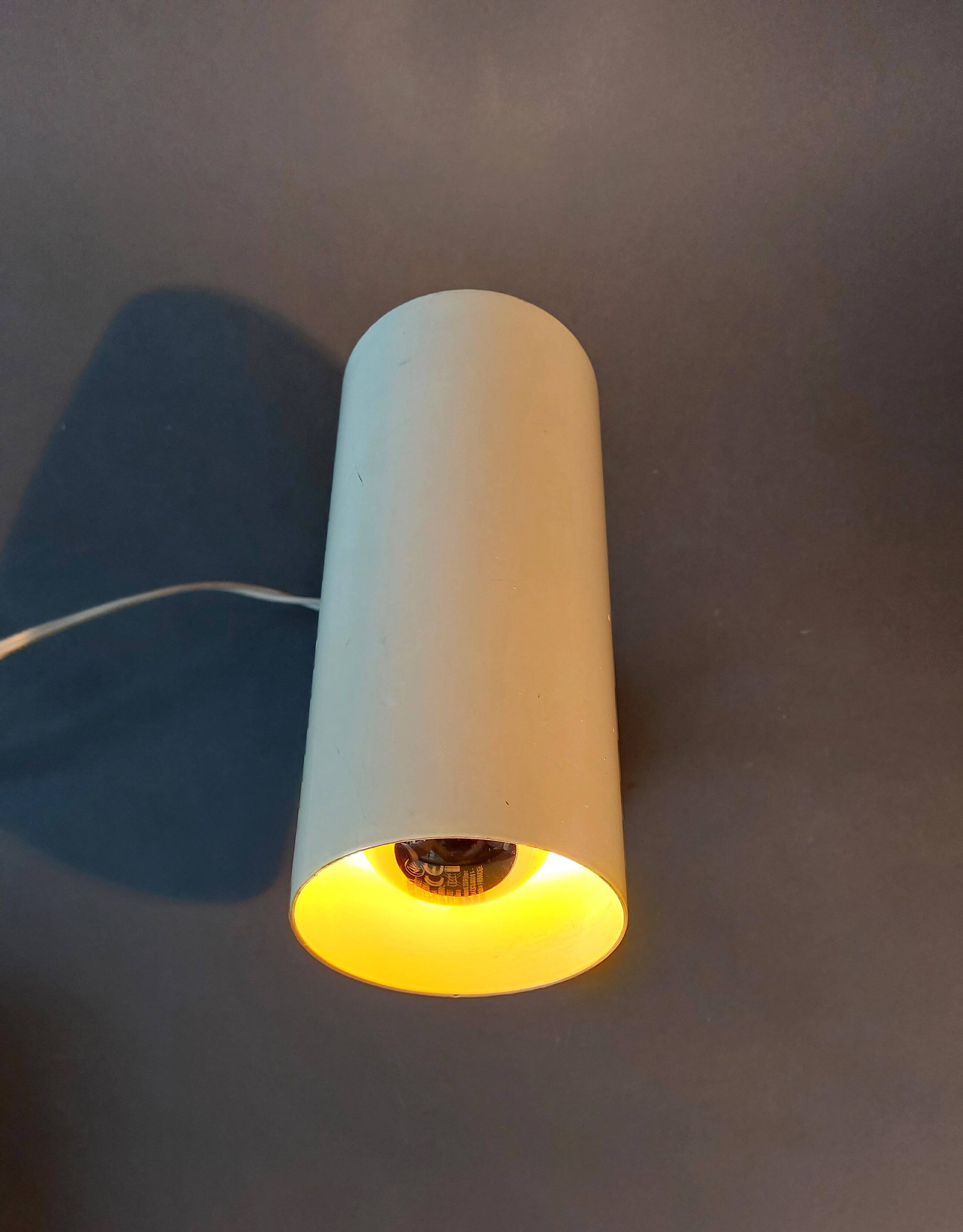 Modernist adjustable wall light 1960 beige lacquered.