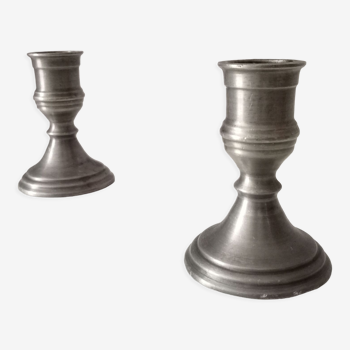 Pair of antique pewter candle holders