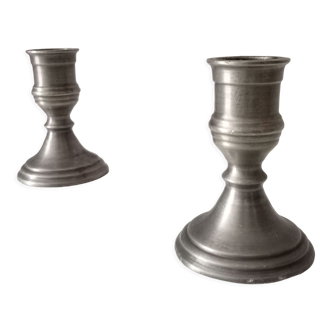 Pair of antique pewter candle holders