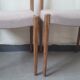 Pair of Scandinavian teak chairs sitting beige gray fabric