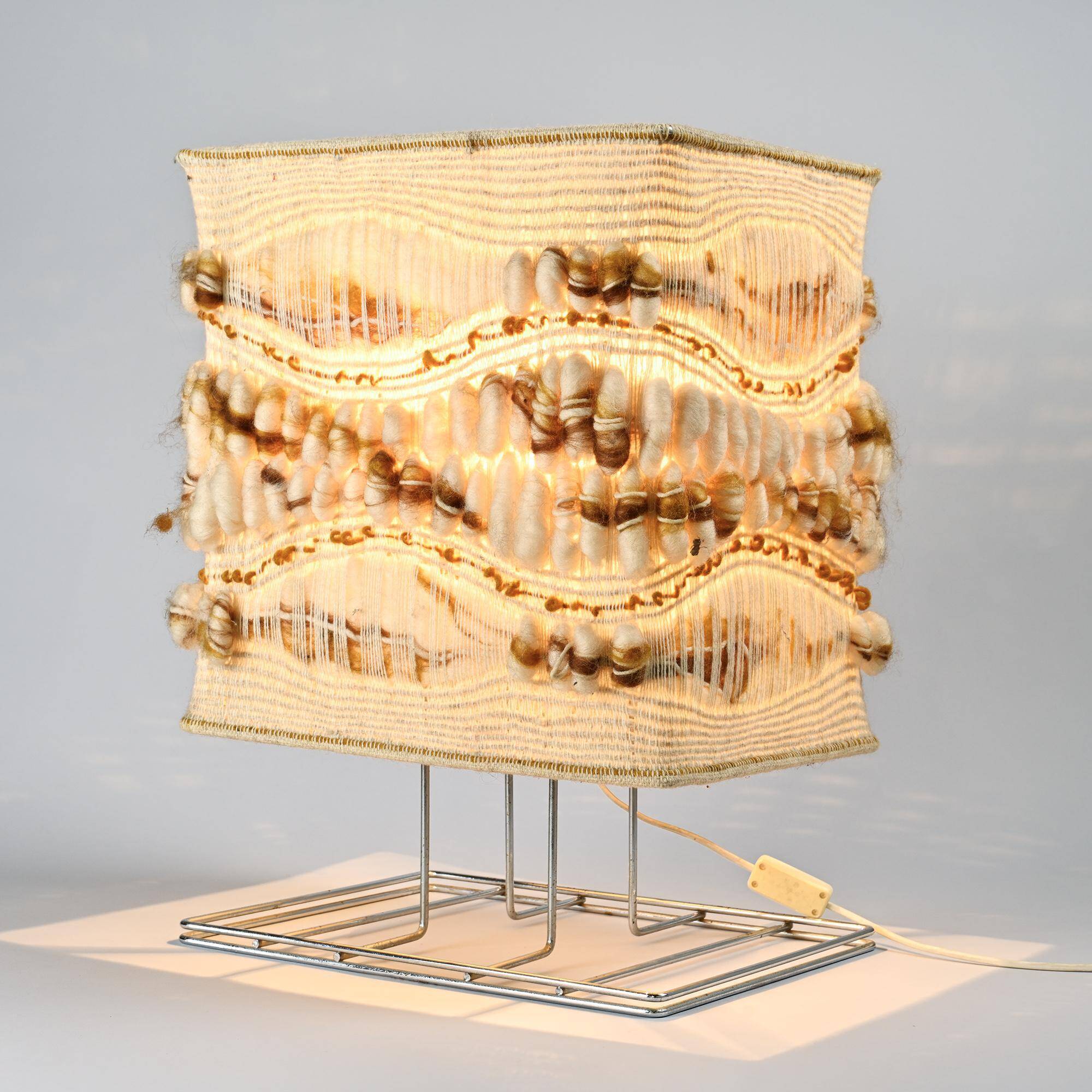 Woven textile and chrome metal table lamp by Max Sauze, circa 1970.