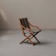 Foldable chair in solid wood and striped fabric, circa 1900.