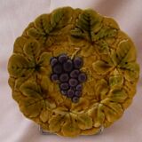 Set of 4 Sarreguemines majolica plates. Fruit decoration.