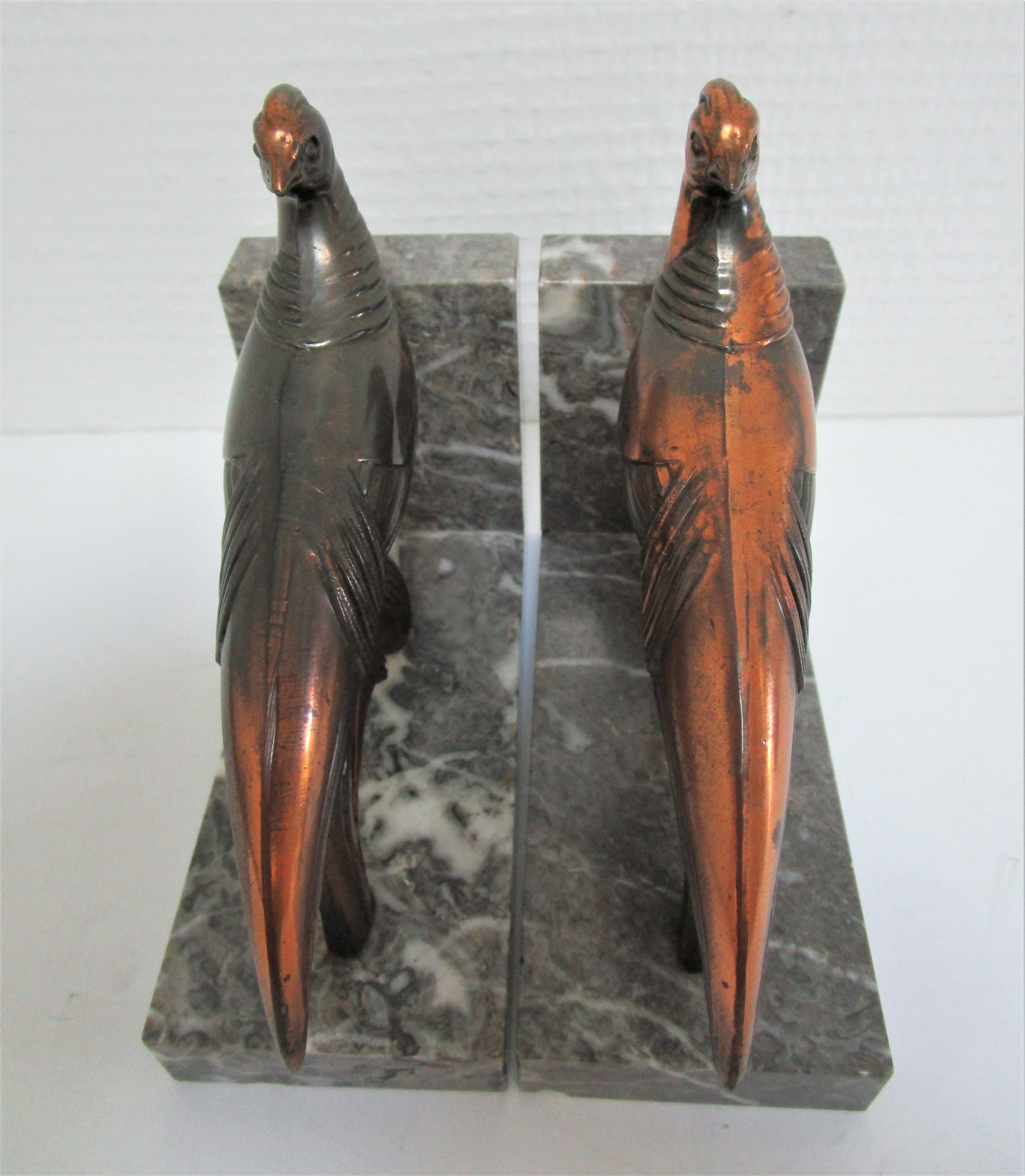 Pair of greenhouse books bird Art Deco metal patinated marble