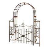 Garden arch with wrought iron gate