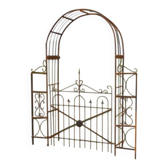 Garden arch with wrought iron gate