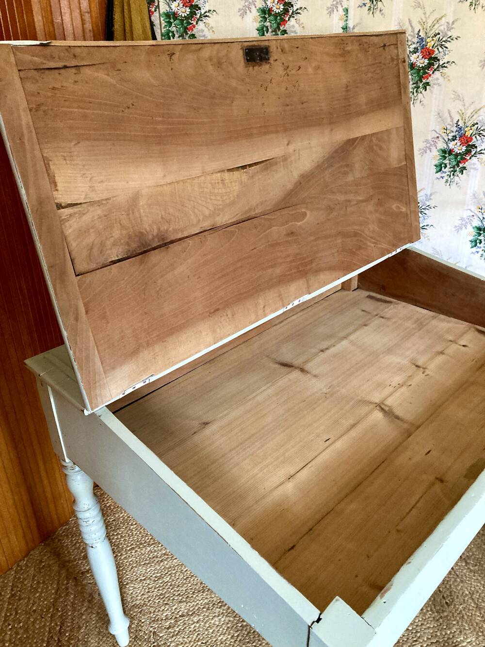 Antique wooden sloped desk, with a drop-down front and turned legs.
