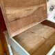 Antique wooden sloped desk, with a drop-down front and turned legs.