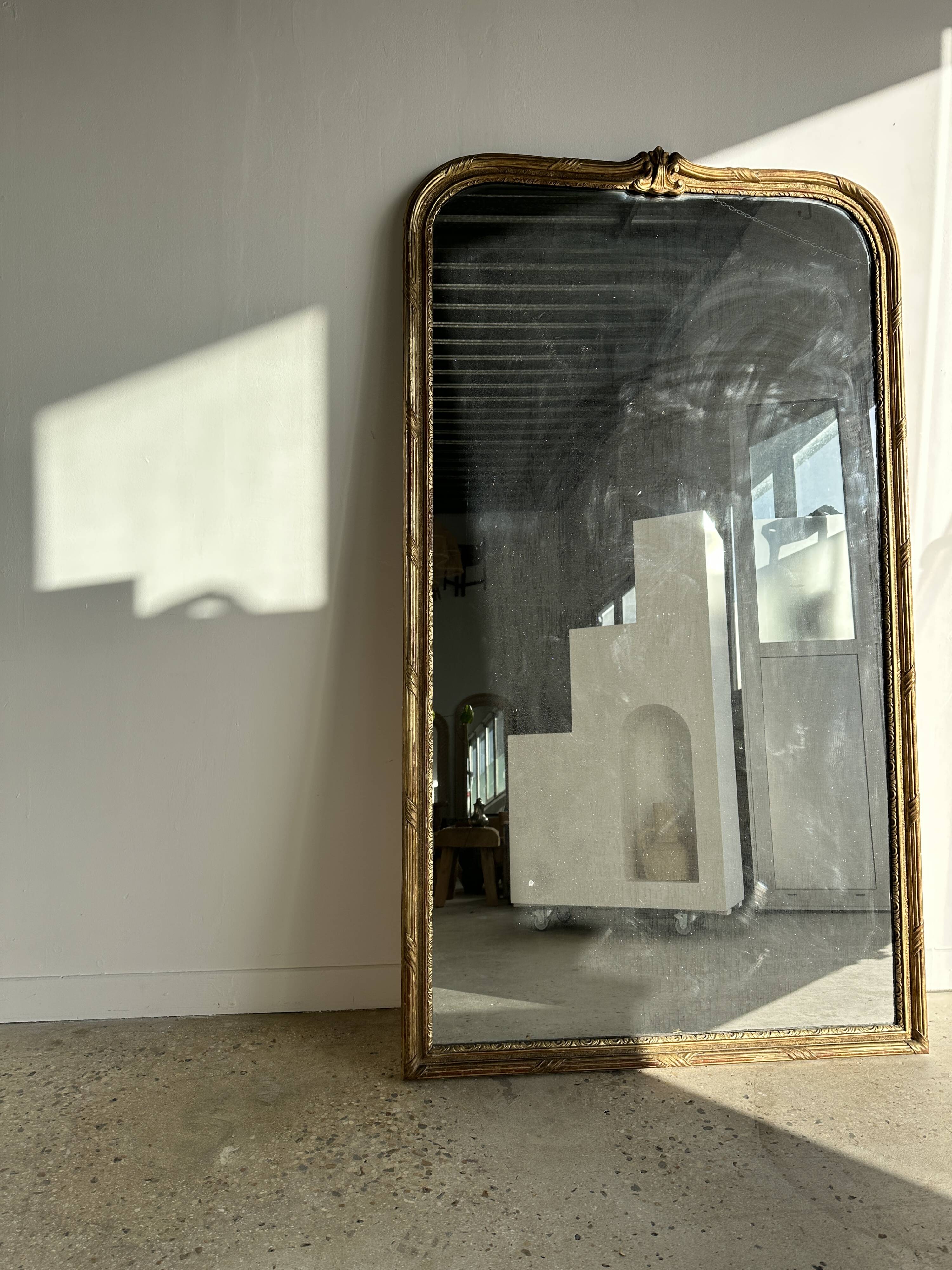 Large gilded mirror 19th century rounded corners mercury glass Louis XVI style