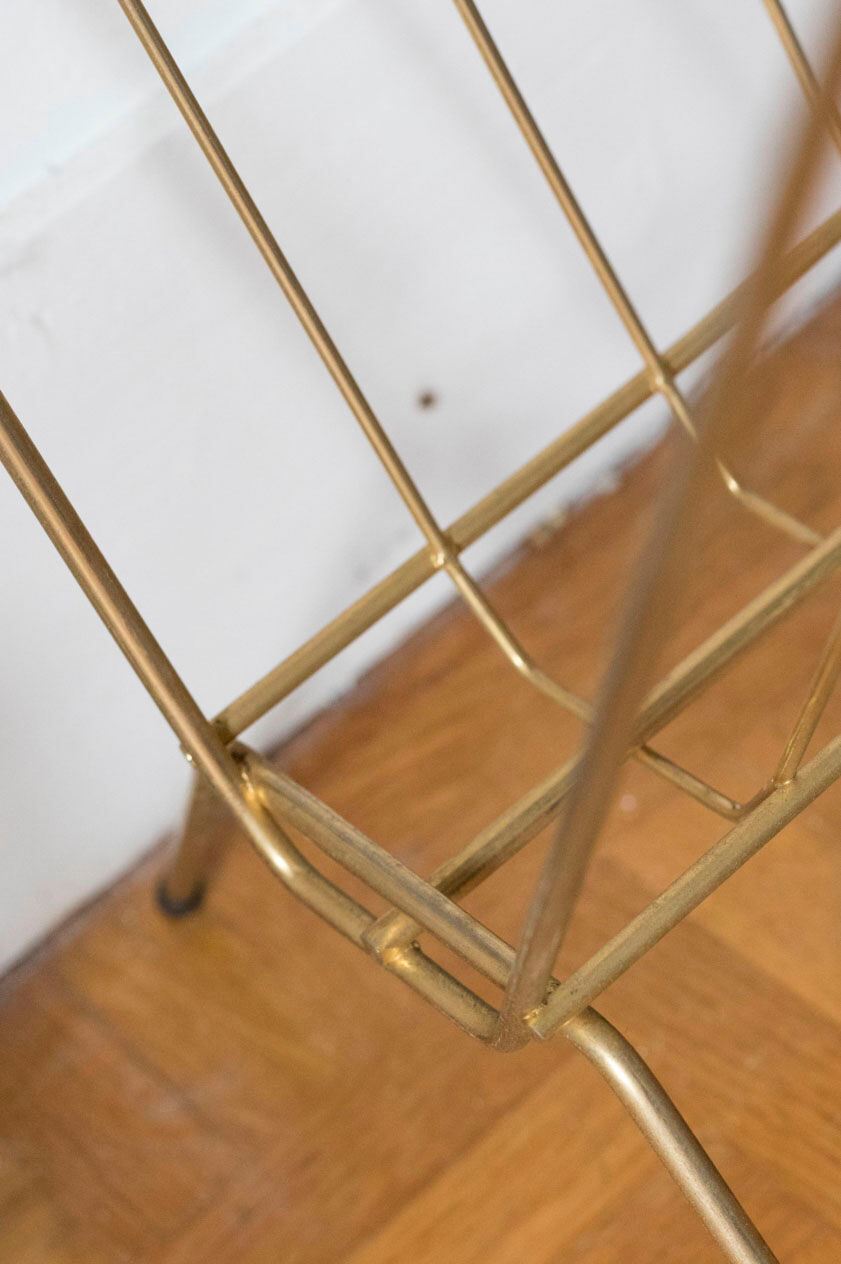 Vintage magazine holder in gold metal
