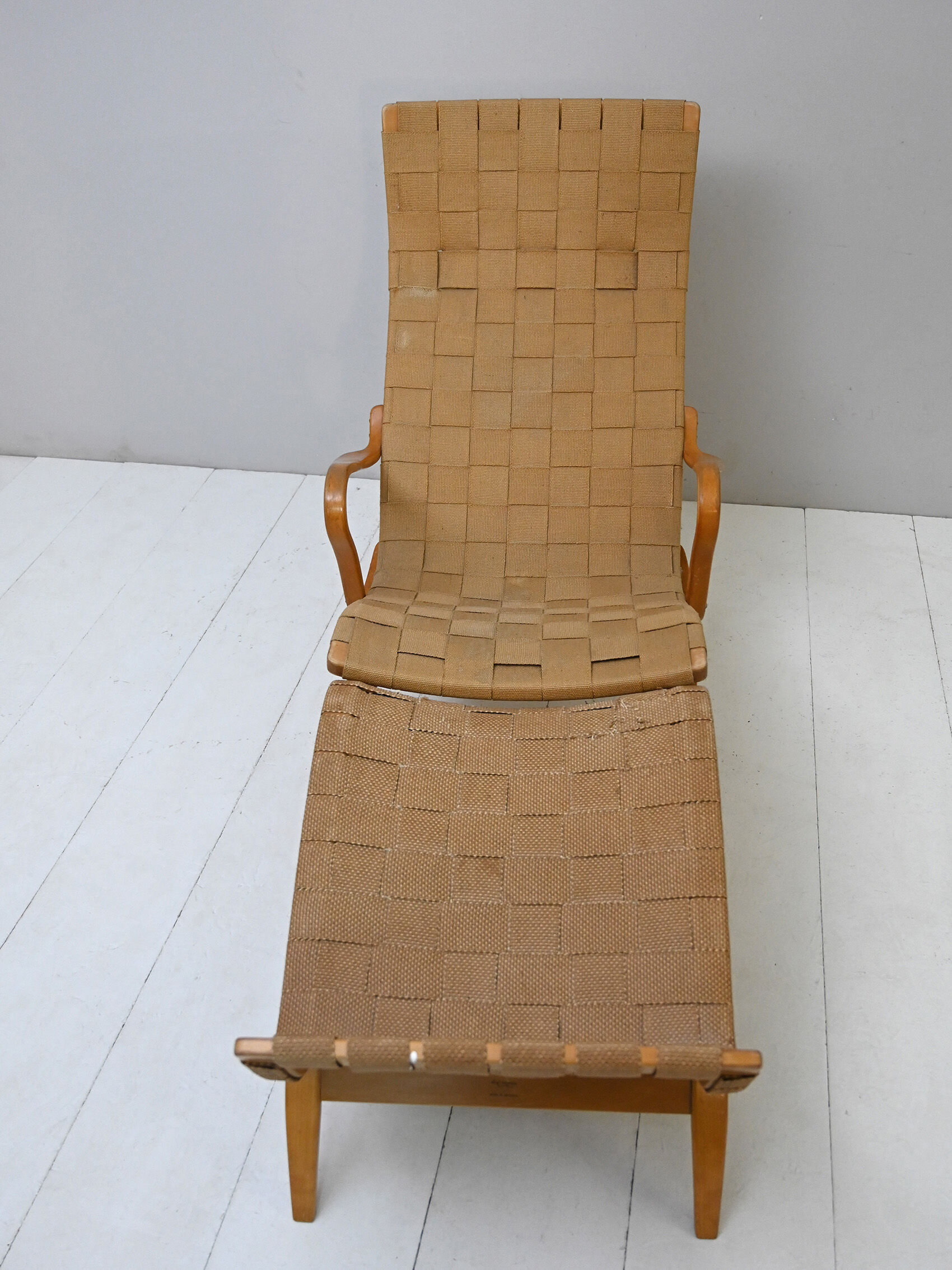 'Pernilla' armchair and footstool designed by Bruno Mathsson