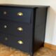 Commode classique noir mat et laiton