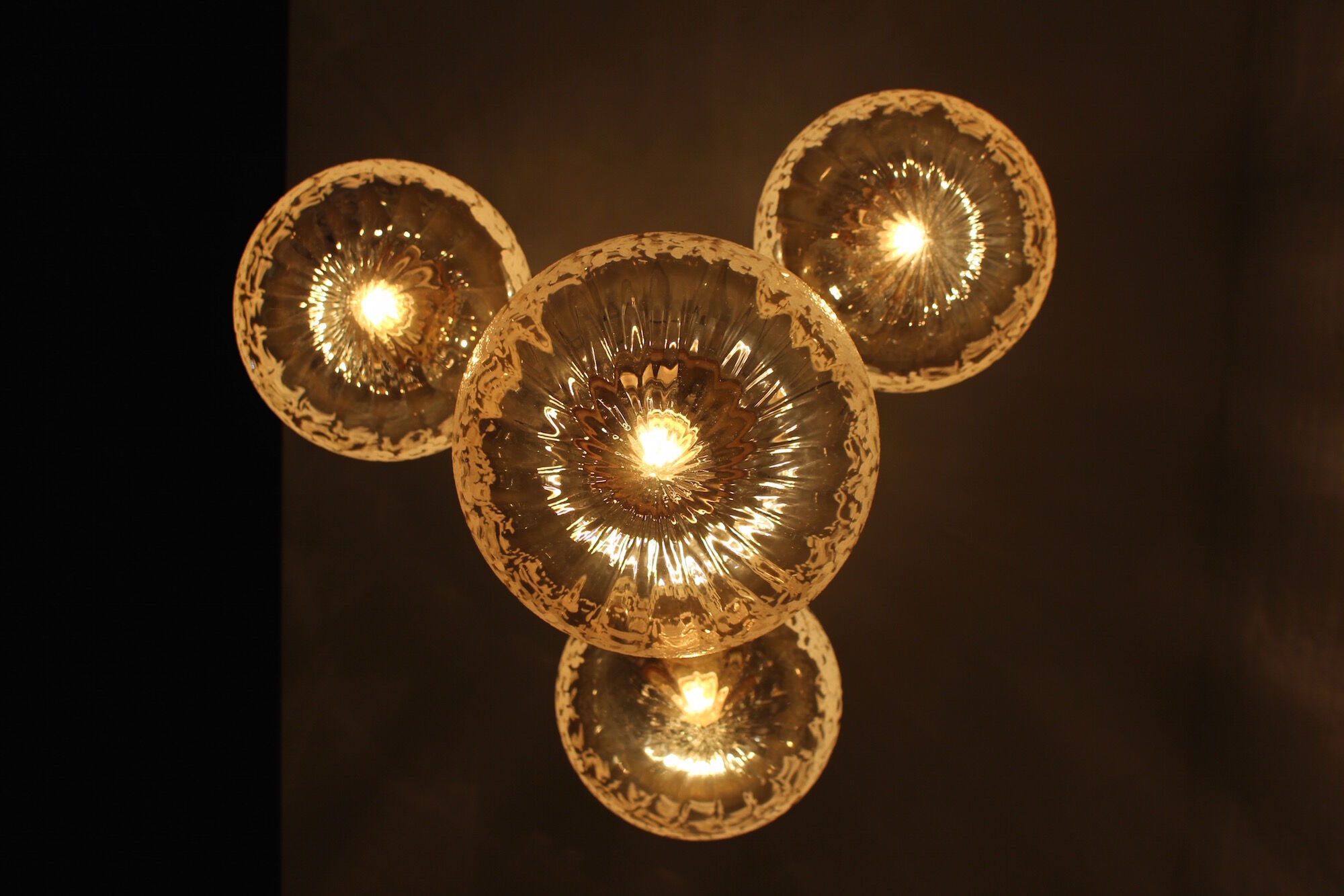 Cascade chandelier 4 globe in blown amber glass
