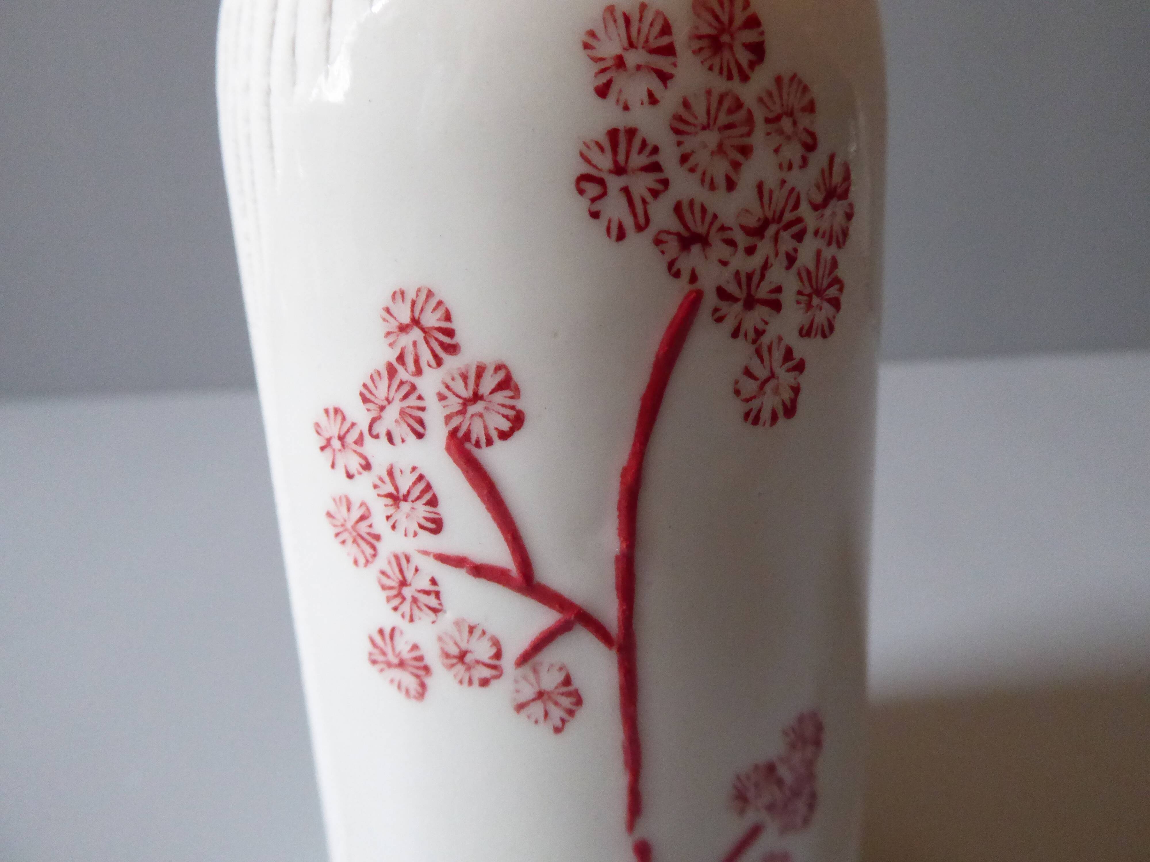 Porcelain vase and biscuit decorated with flowers