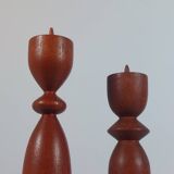 Vintage pair of sculptural teak candlesticks in Scandinavian style.