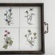Old wooden plateau with floral tiles