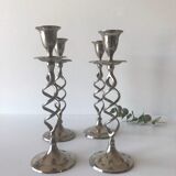 Four twisted silver candlesticks