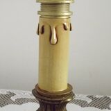 Vintage French bronze Wee Willie Winkie style lamp with red card shade.