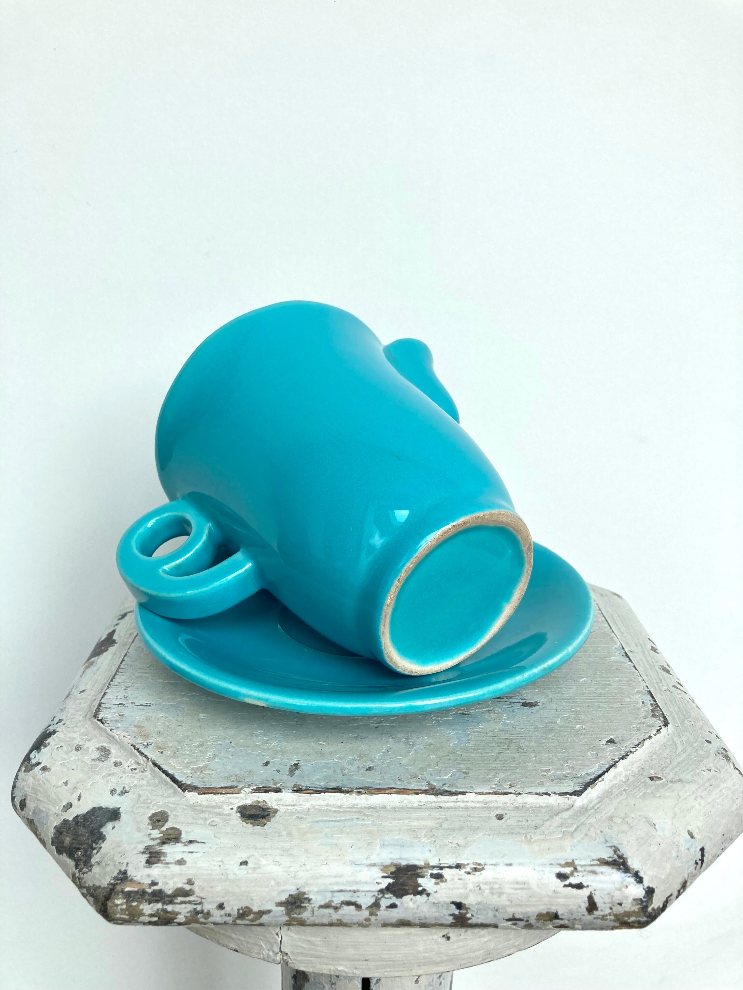 Milk jug on plate