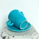 Milk jug on plate